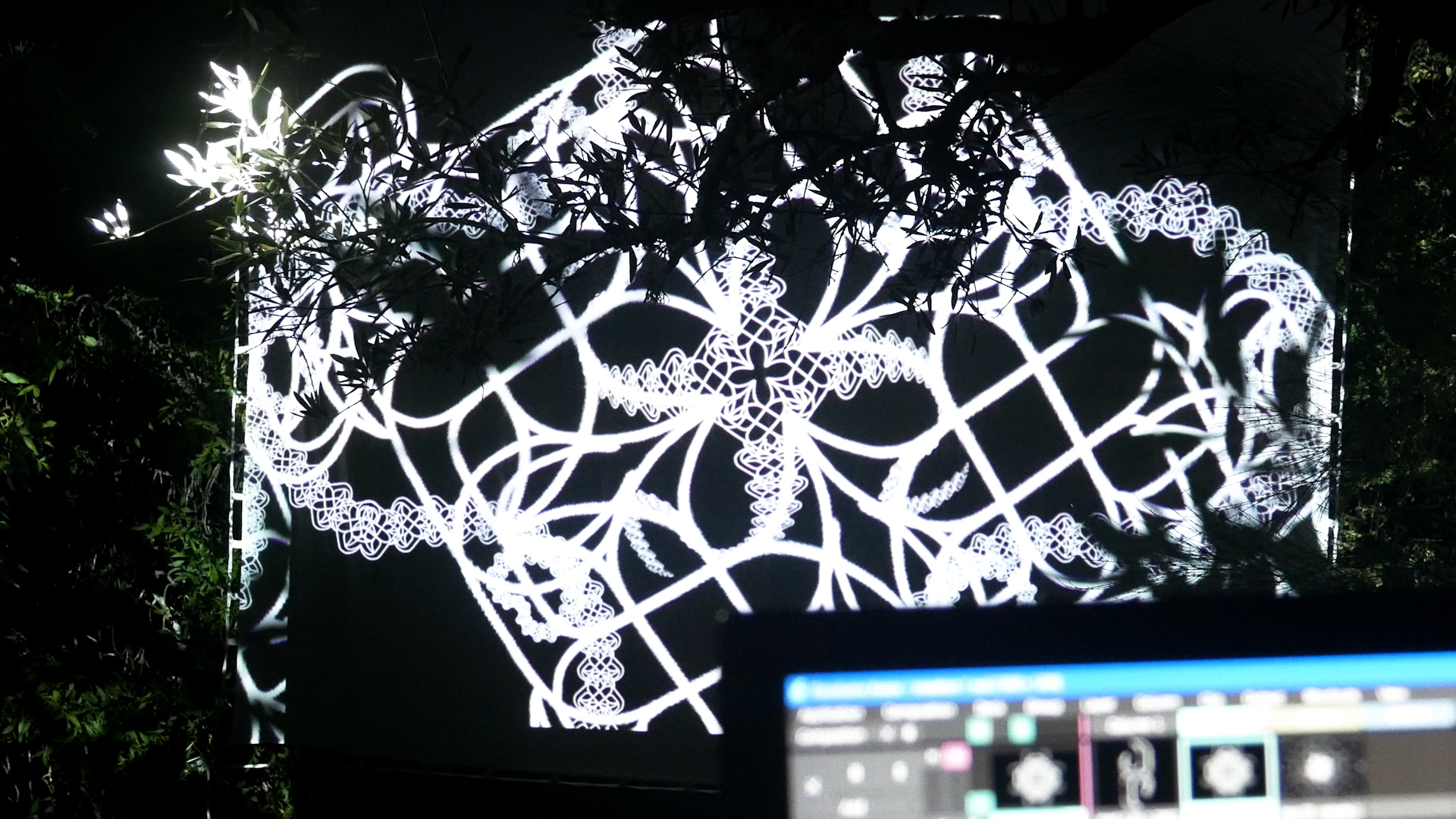 Hypérion installation — vaulted space with projected ornamental light